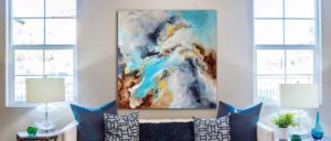 Tableau moderne de l'artiste Christophe Baudin au format 80x80 cm - Mer turquoise, ciel abstrait, photo satellite, teintes bleues, turquoises, grises et brunes. Un tableau riche en textures